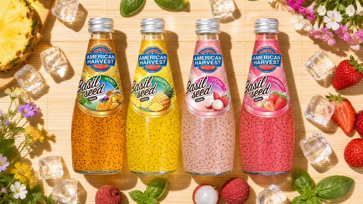 American Harvest mango and blueberry basil seed drink bottles with glasses of ice and fruit